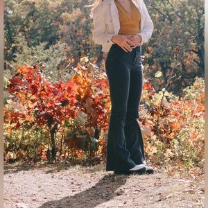 Crop top. Really cute but bigger bust.